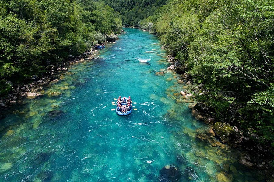 Rafting on the beautiful mountain river. Aerial view of rafting